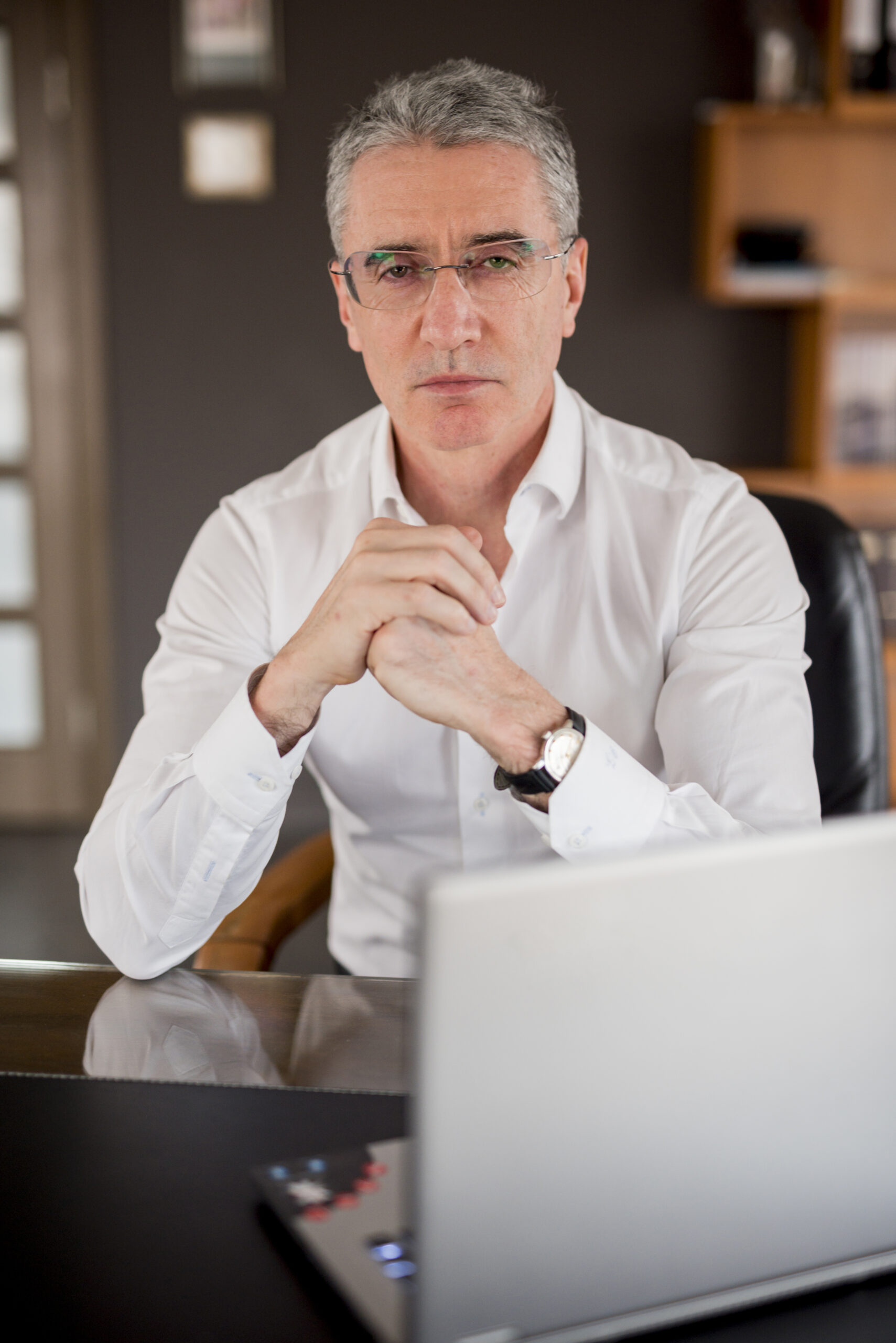 elderly-businessman-with-laptop