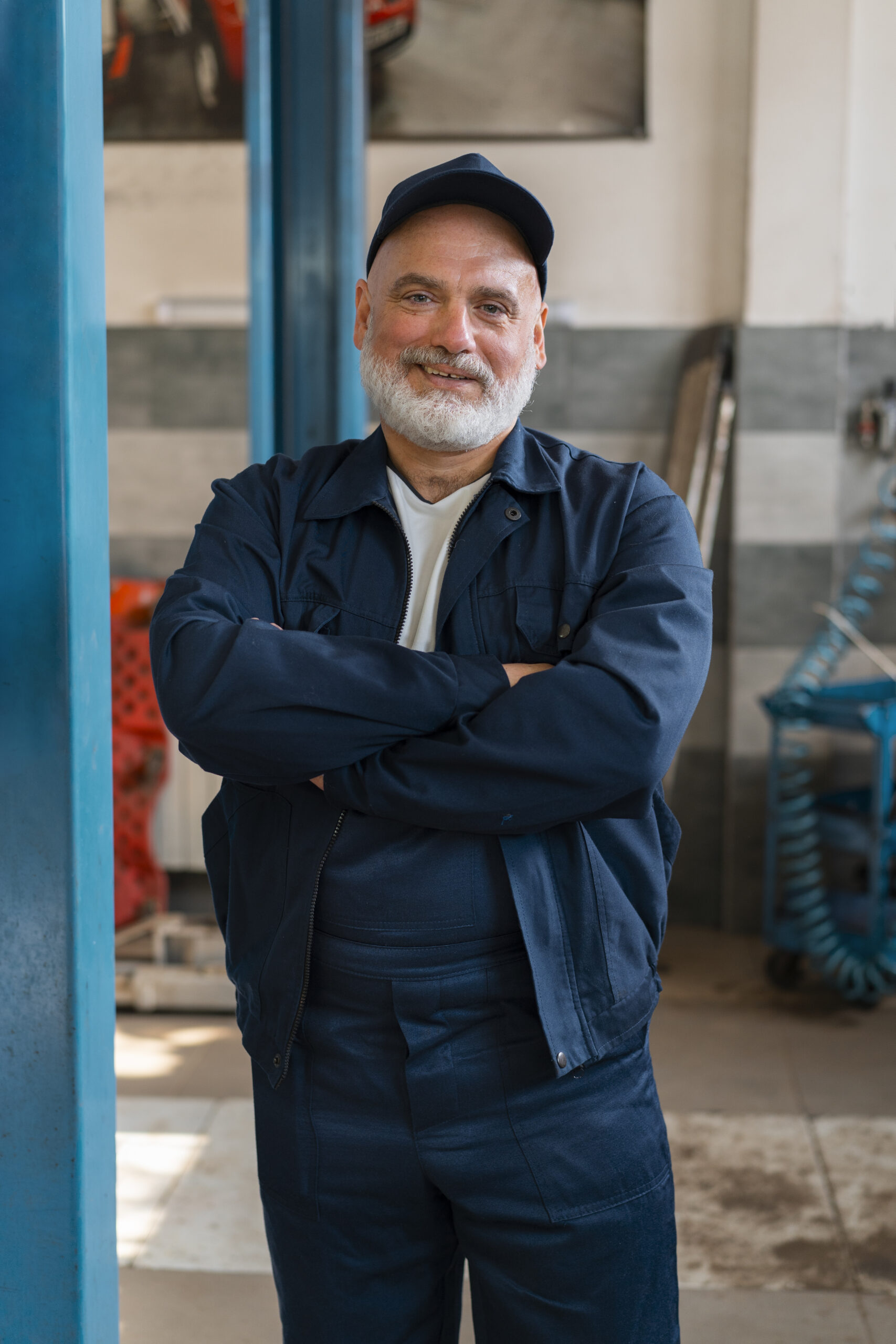 portrait-male-car-mechanic-car-repair-shop